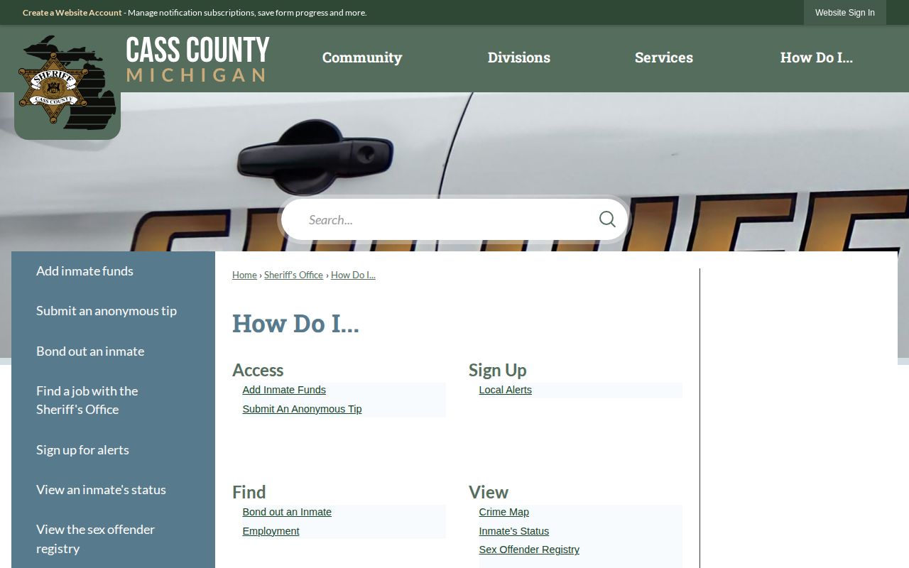 Cass County service directory with inmate status and alert links